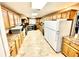 Spacious kitchen with ample counter space, cabinetry, and modern appliances at 4740 Carrington Ct # 4740, New Port Richey, FL 34655