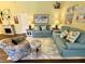 Inviting living space with tile flooring, stylish furnishings, and light-filled ambiance at 4740 Carrington Ct # 4740, New Port Richey, FL 34655