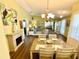 Open-concept living space featuring stylish decor and a dining area at 4740 Carrington Ct # 4740, New Port Richey, FL 34655