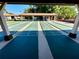 Multiple shuffleboard courts providing residents with recreation and leisure activities at 4740 Carrington Ct # 4740, New Port Richey, FL 34655