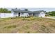 Charming single-story home with a well-maintained lawn, stone accents, and an attached two-car garage at 507 Hammock Dr, Palm Harbor, FL 34683