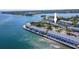 Waterfront condos featuring coastal living with boat docks and lush landscaping on a sunny day at 5225 Coquina Key Se Dr # B, St Petersburg, FL 33705