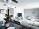 Open-concept living space with neutral decor, featuring a living room and dining area, filled with natural light at 5225 Coquina Key Se Dr # B, St Petersburg, FL 33705