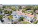 Aerial view of a residential area with well-maintained homes, tropical trees, and a variety of roof styles at 53 Albemarle Ave, Tampa, FL 33606