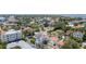 Picturesque aerial view of a vibrant neighborhood with mature trees and diverse architectural styles near the water at 53 Albemarle Ave, Tampa, FL 33606