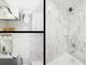 Bathroom collage featuring modern vanity, countertop, and new marble tile at 53 Albemarle Ave, Tampa, FL 33606
