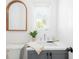Elegant bathroom with a wood-framed mirror, modern fixtures, and a stylish sink and vanity combo at 53 Albemarle Ave, Tampa, FL 33606