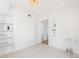 Versatile bonus room with bright lighting, built-in shelving, and stylish decor, perfect for entertaining or relaxing at 53 Albemarle Ave, Tampa, FL 33606