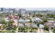 Charming neighborhood view showcasing a mix of residential buildings, lush greenery, and the city skyline in the distance at 53 Albemarle Ave, Tampa, FL 33606