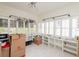 Bright room featuring ample shelving and storage, with white plantation shutters for natural light at 53 Albemarle Ave, Tampa, FL 33606