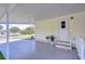 Spacious carport featuring concrete flooring and convenient access to the home's entrance at 5721 Apache St, Zephyrhills, FL 33542