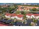 Aerial view of condo complex with well-kept landscaping, parking, and surrounding waterways at 6085 Bahia Del Mar Blvd # 106, St Petersburg, FL 33715