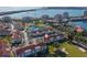 Panoramic aerial view featuring water, bridge, and community with ponds and parking at 6085 Bahia Del Mar Blvd # 106, St Petersburg, FL 33715