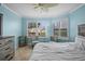 Serene bedroom with plantation shutters, neutral tones, and comfortable furnishings at 6085 Bahia Del Mar Blvd # 106, St Petersburg, FL 33715