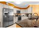 Well-equipped kitchen with stainless steel appliances, granite countertops, and ample cabinet space at 6085 Bahia Del Mar Blvd # 106, St Petersburg, FL 33715