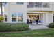 Inviting patio with stylish seating, perfect for relaxing outdoors with a well-maintained garden at 6085 Bahia Del Mar Blvd # 106, St Petersburg, FL 33715