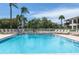 Relax in the community swimming pool with plenty of lounge chairs at 6085 Bahia Del Mar Blvd # 106, St Petersburg, FL 33715