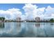Beautiful serene water views of the community buildings surrounding a peaceful pond at 6085 Bahia Del Mar Blvd # 106, St Petersburg, FL 33715