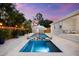 The backyard features a sparkling pool and spa with the bonus of a cabana for relaxing and escaping the sun at 6121 33Rd N Ave, St Petersburg, FL 33710