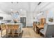 Open-concept kitchen with stainless steel appliances, granite countertops and a breakfast bar with seating for three at 6121 33Rd N Ave, St Petersburg, FL 33710