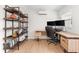 Office space features a modern desk setup, shelving, and a window for a bright and productive environment at 6121 33Rd N Ave, St Petersburg, FL 33710
