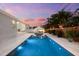 Backyard pool view showcasing luxury in-ground pool, cabana, and outdoor living area at 6121 33Rd N Ave, St Petersburg, FL 33710