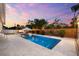 A stunning backyard oasis with a beautiful in-ground pool, lounge chairs, and a cozy gazebo at 6121 33Rd N Ave, St Petersburg, FL 33710