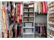 Organized walk-in closet featuring clothing racks, shelves, and drawers, maximizing space and style at 6121 33Rd N Ave, St Petersburg, FL 33710