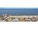 Great aerial view of the beach area and homes in the neighborhood at 6121 Fjord Way, New Port Richey, FL 34652