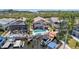 Stunning aerial view showcasing the home's pool, boat dock, and waterfront access at 6121 Fjord Way, New Port Richey, FL 34652