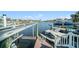 Waterfront property featuring a private dock and boat lift for easy access to water activities at 6121 Fjord Way, New Port Richey, FL 34652