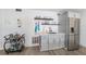 Convenient kitchenette equipped with modern appliances, ample counter space, and stylish bar cart at 6121 Fjord Way, New Port Richey, FL 34652