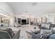 Spacious living room with tile floors, open layout and stylish modern furniture at 6121 Fjord Way, New Port Richey, FL 34652