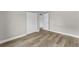 The bedroom features gray walls and hardwood floors, plus a large closet at 6812 Fountain Ave, Tampa, FL 33634