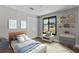 Bedroom featuring decor, a modern black-frame window, and a closet at 6812 Fountain Ave, Tampa, FL 33634