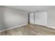 Bedroom featuring modern flooring, large closets, and ample space at 6812 Fountain Ave, Tampa, FL 33634