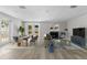 Cozy living room featuring a fireplace and comfortable seating arrangement at 6812 Fountain Ave, Tampa, FL 33634