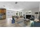 Cozy living room featuring a fireplace and comfortable seating arrangement at 6812 Fountain Ave, Tampa, FL 33634
