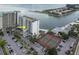 Aerial view of the condos, tennis courts, swimming pool, parking and direct beach access at 7150 Sunset Way # 405, St Pete Beach, FL 33706