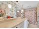 Charming bathroom featuring colorful decor and well-maintained fixtures at 7150 Sunset Way # 405, St Pete Beach, FL 33706