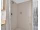 Shower stall featuring tiled walls, shower head and built-in soap dish at 7150 Sunset Way # 405, St Pete Beach, FL 33706