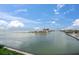 Panoramic water view from the condo, with the shoreline in the distance at 7150 Sunset Way # 405, St Pete Beach, FL 33706