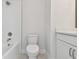 Fresh bathroom with a tub-shower combination, toilet, and vanity with ample lighting at 7232 Sutton Ln, Sarasota, FL 34240