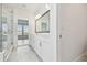 Spacious bathroom with a glass shower, double sinks, and plenty of cabinet space at 7232 Sutton Ln, Sarasota, FL 34240
