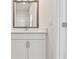 Clean bathroom featuring a vanity with modern fixtures and ample counter space at 7232 Sutton Ln, Sarasota, FL 34240