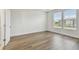 Bedroom with lots of natural light from two large windows overlooking the neighborhood at 7232 Sutton Ln, Sarasota, FL 34240