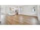 Open concept living and dining area with a modern island kitchen at 7232 Sutton Ln, Sarasota, FL 34240
