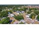 An aerial view of the neighborhood showcases the charming home, surrounded by lush trees and well-maintained streets at 785 52Nd N Ave, St Petersburg, FL 33703