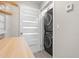 Convenient laundry room with stacked washer and dryer units for space-saving efficiency at 785 52Nd N Ave, St Petersburg, FL 33703