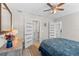 Well-lit bedroom with ensuite bathroom and closet access through modern paneled doors at 785 52Nd N Ave, St Petersburg, FL 33703